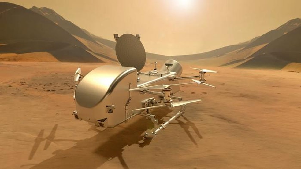 O helicóptero Dragonfly deve chegar à Titã em 2034 — Foto: NASA/Johns Hopkins APL/Steve Gribben