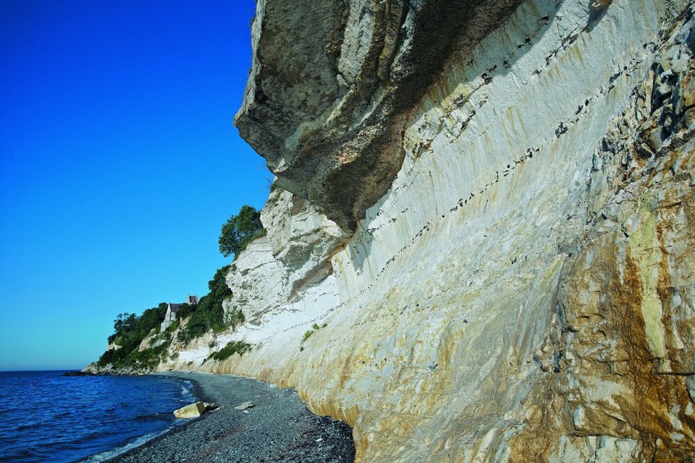 Stevns Klint é um testemunho globalmente excepcional do impacto do impacto de meteoritos na história da vida na Terra. A propriedade fornece evidências do impacto do meteorito Chixulub que ocorreu no final do Período Cretáceo, cerca de 67 milhões de anos atrás — Foto: Jacob Lautrup/Unesco