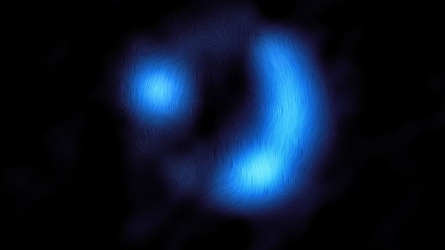 Imagem mostra a orientação do campo magnético na distante galáxia 9io9, vista aqui quando o Universo tinha apenas 20% da sua idade atual