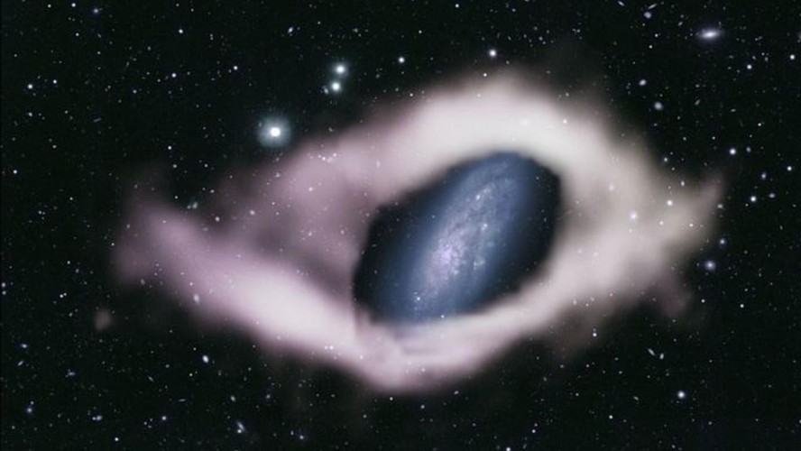 Imagem mostra um anel gasoso circulando perpendicularmente no disco espiral principal da galáxia NGC 4632